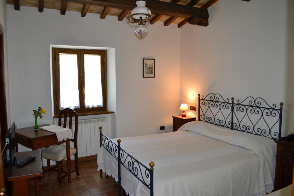 Postel nebo postele na pokoji v ubytování Albergo Fontanelle