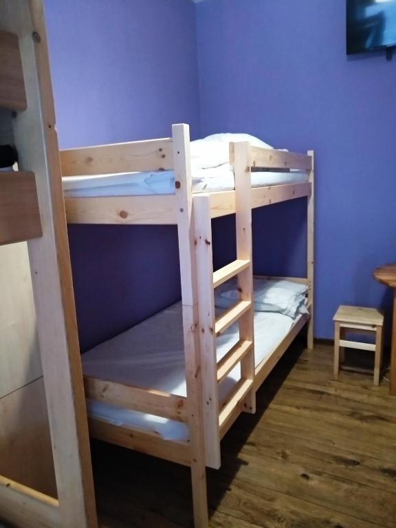 Postel nebo postele na pokoji v ubytování Jopi Hostel Katowice Centrum