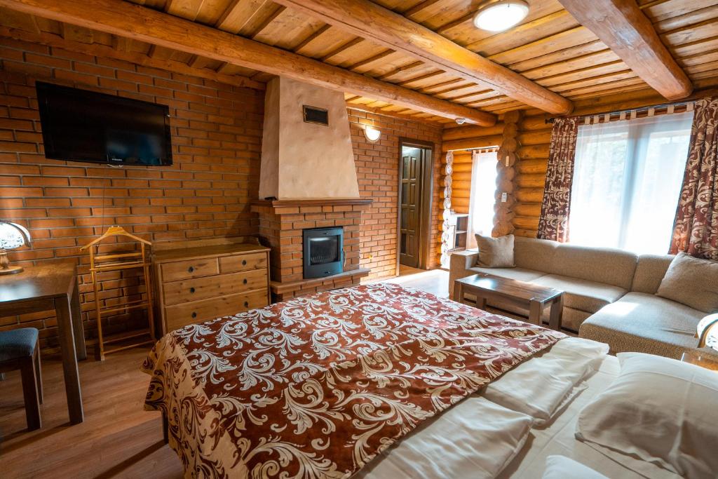 Postel nebo postele na pokoji v ubytování Villa Garden Hotel