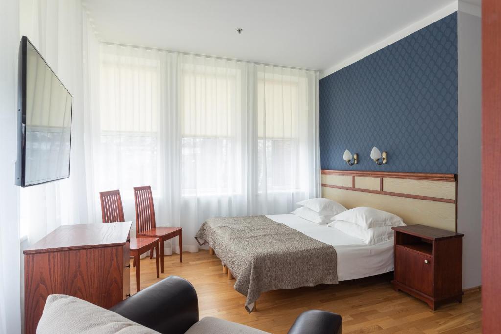 Postel nebo postele na pokoji v ubytování Hotel Villa Wesset