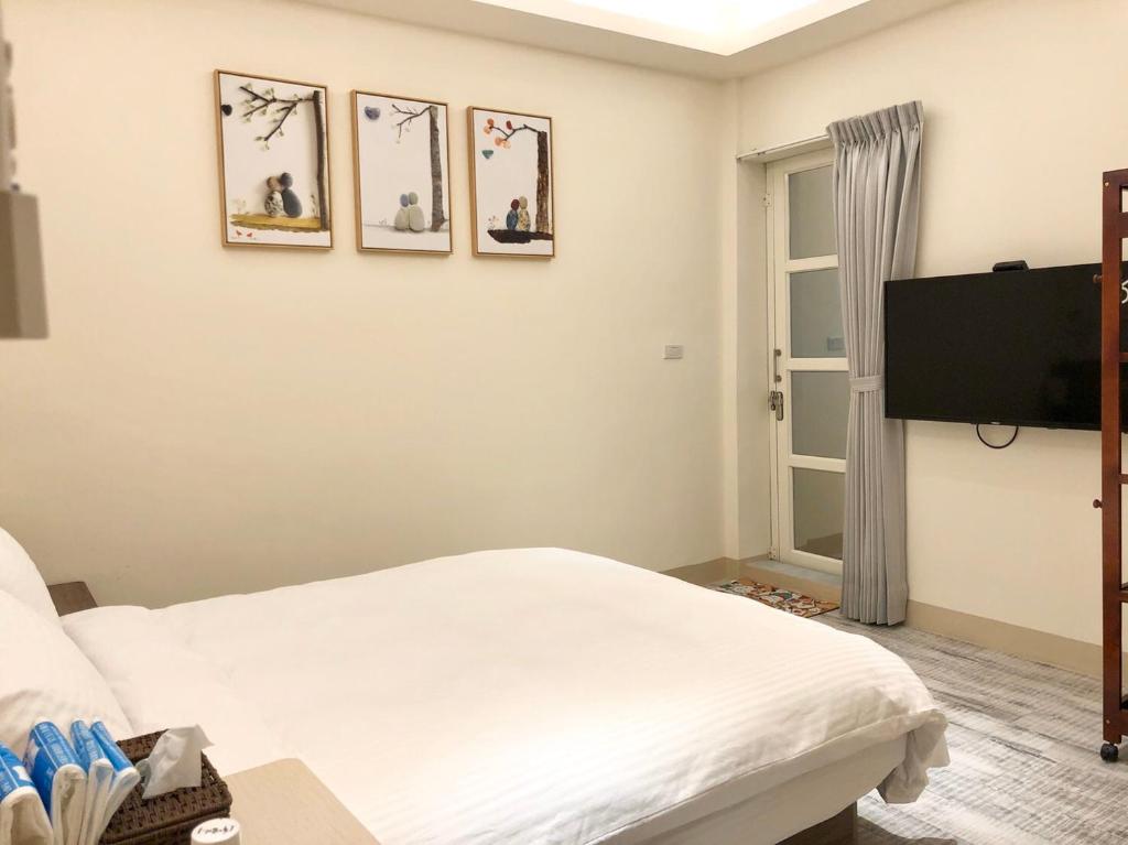 TV a/nebo společenská místnost v ubytování Yu Shou Hao Hsien Guesthouse