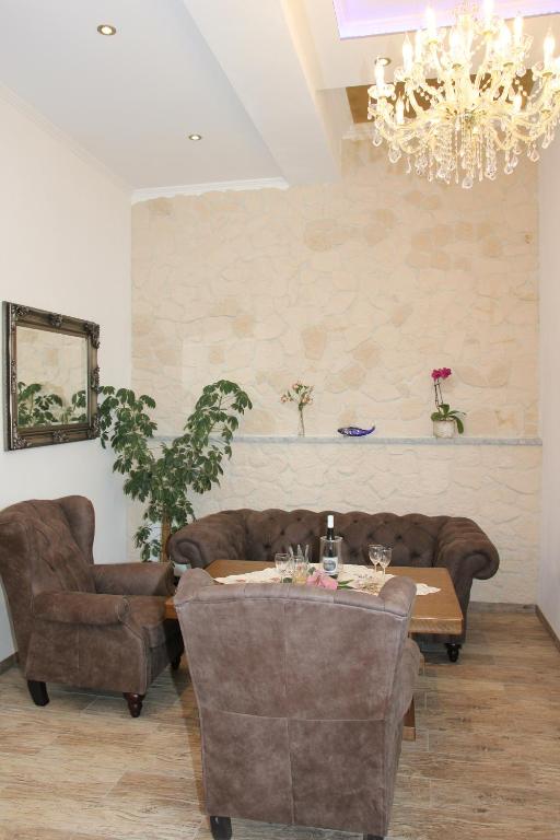 Posezení v ubytování Hotel Am Donaubogen