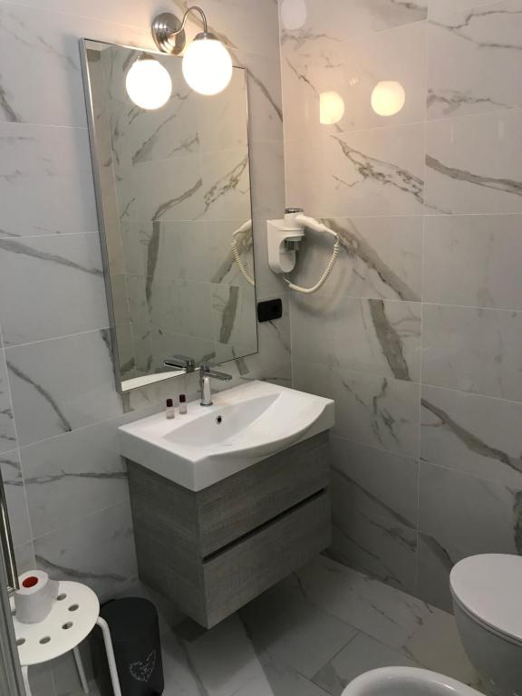 Koupelna v ubytování Hotel Paola