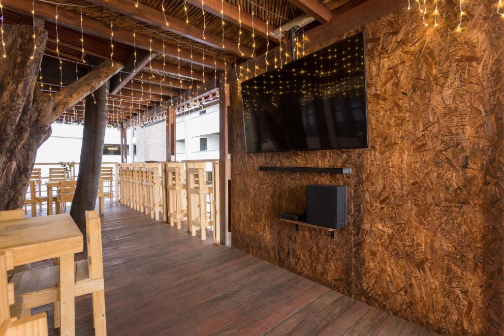 TV o dispositivi per l'intrattenimento presso Parceros Med Hostel