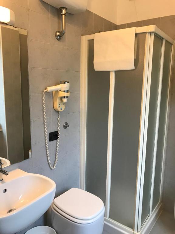 Koupelna v ubytování Hotel Paola