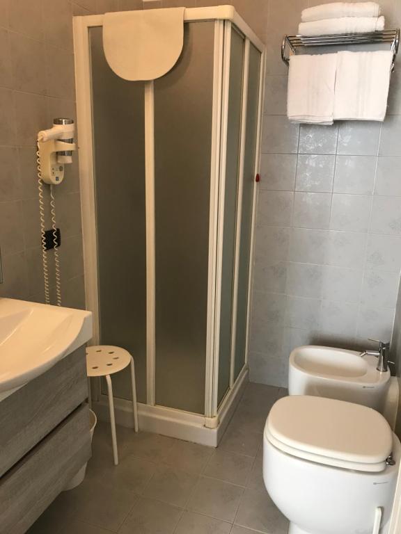 Koupelna v ubytování Hotel Paola