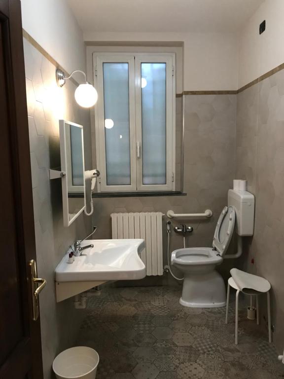 Koupelna v ubytování Hotel Paola