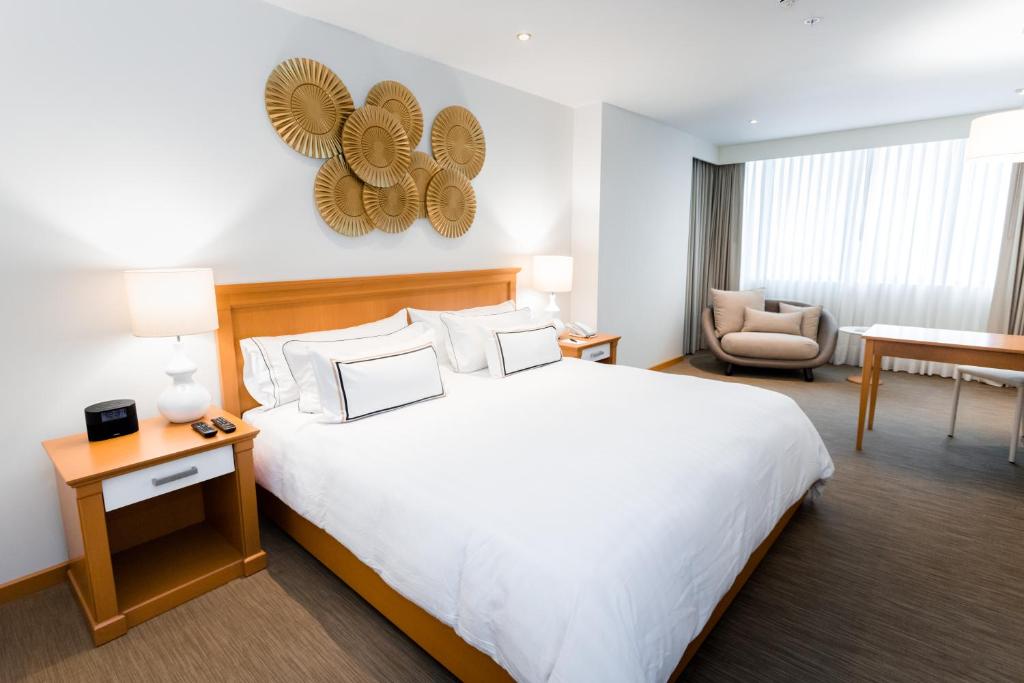 Cama o camas de una habitación en Hotel Melia Lima