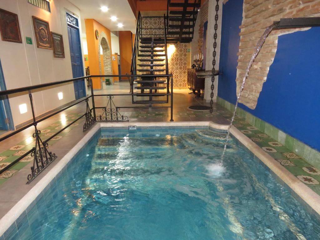בריכת השחייה שנמצאת ב-Hotel Boutique La Solera Del Pozo או באזור