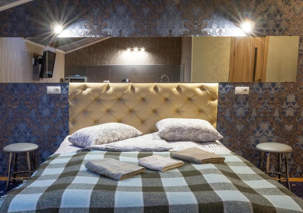 Postel nebo postele na pokoji v ubytování Hotel UNENEGE