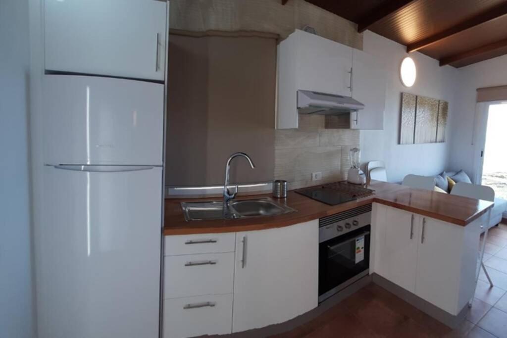 Kuchyň nebo kuchyňský kout v ubytování Casita con Encanto