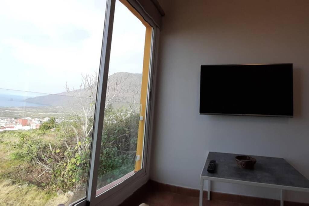 TV a/nebo společenská místnost v ubytování Casita con Encanto