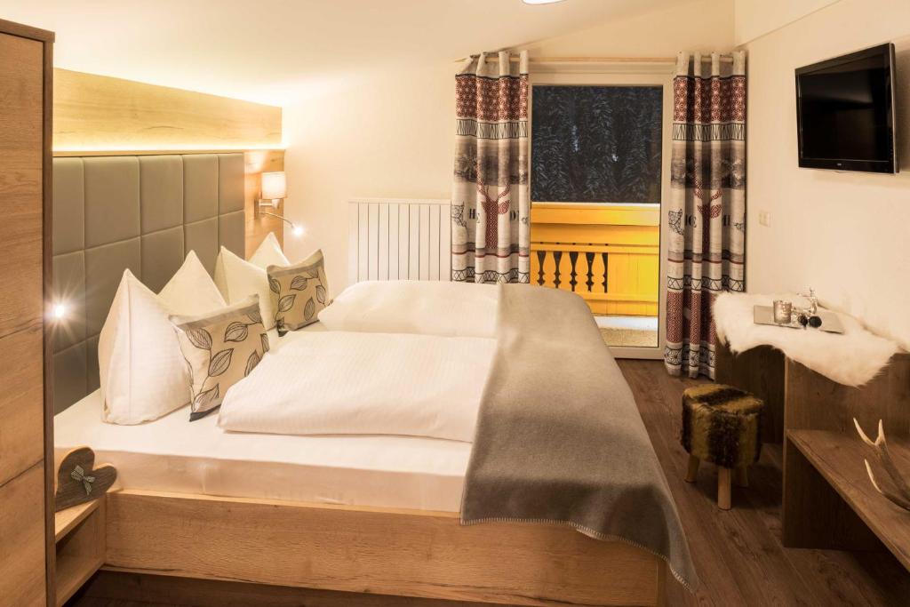 Postel nebo postele na pokoji v ubytování Bergspitz Luxury Appartement
