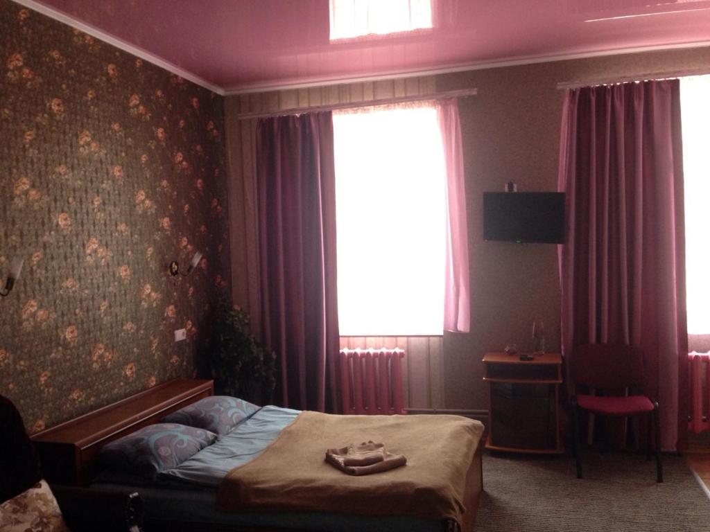 Postel nebo postele na pokoji v ubytování Hotel UNENEGE
