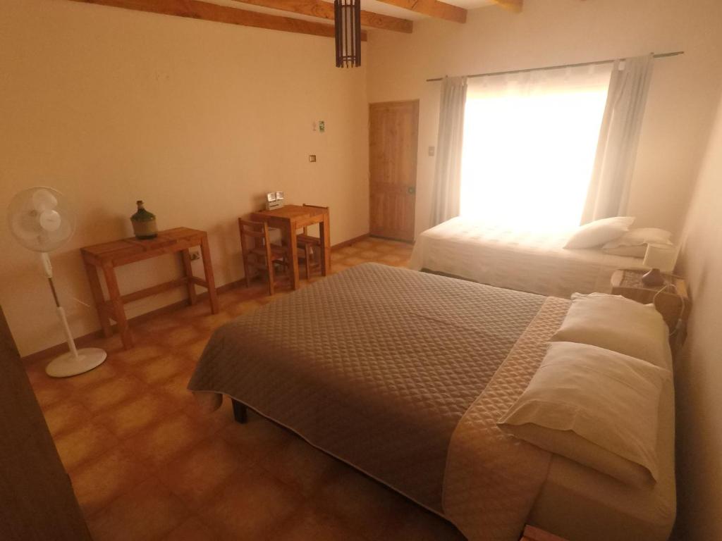 Postel nebo postele na pokoji v ubytování Casa Ckelar Atacama