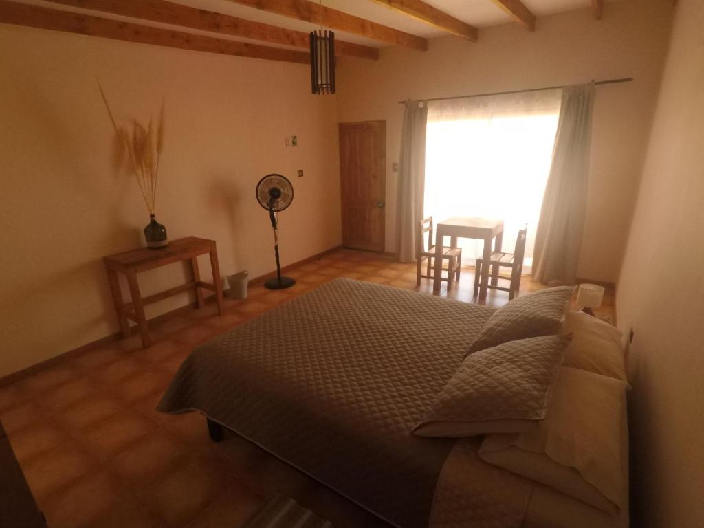 Postel nebo postele na pokoji v ubytování Casa Ckelar Atacama