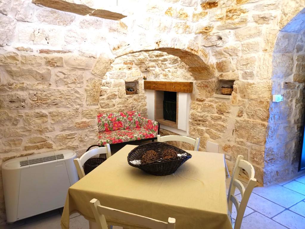 Część wypoczynkowa w obiekcie Trullo Madia e Dimora Giorgio