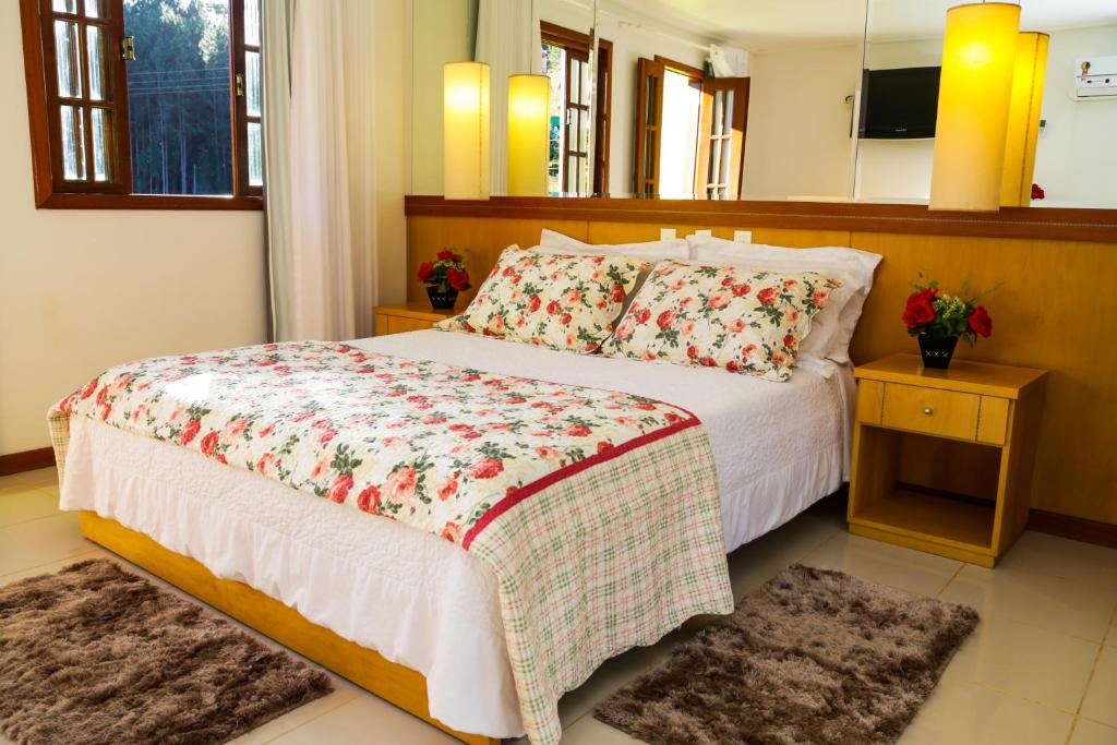 Postel nebo postele na pokoji v ubytování Hotel Fazenda China Park
