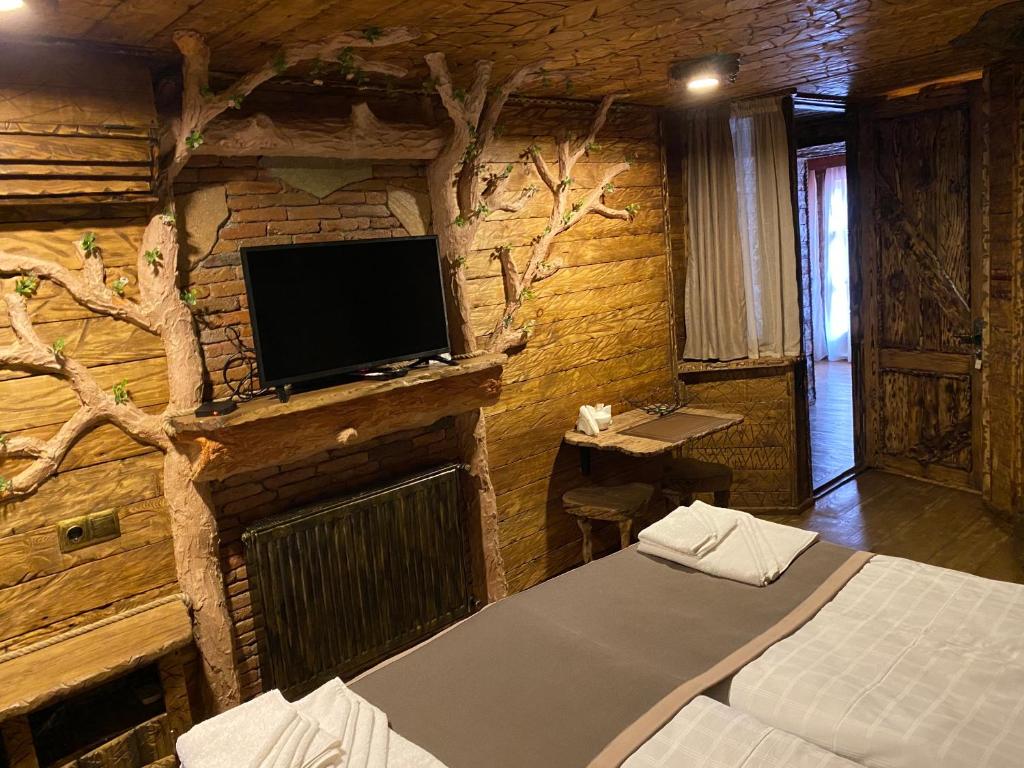 TV a/nebo společenská místnost v ubytování Boutique Fantasy
