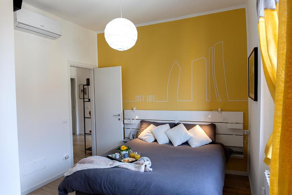 Postel nebo postele na pokoji v ubytování B&B La Terrazza di Barbara
