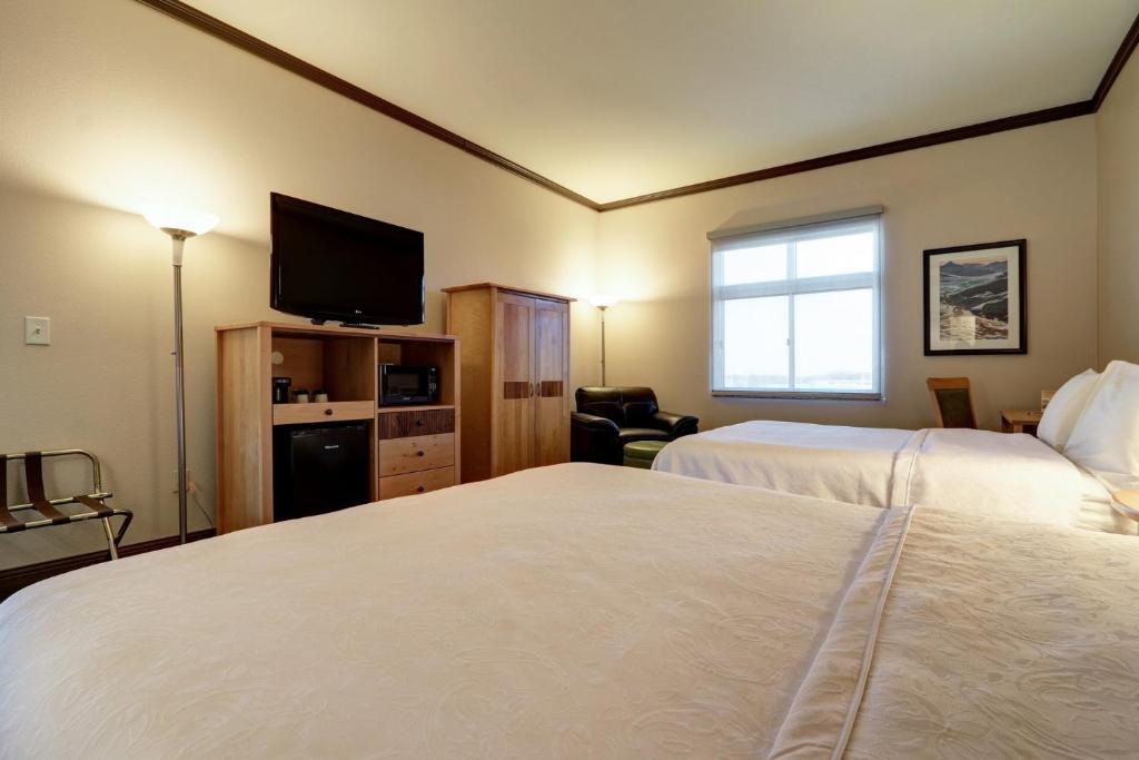 Postel nebo postele na pokoji v ubytování Dimond Center Hotel