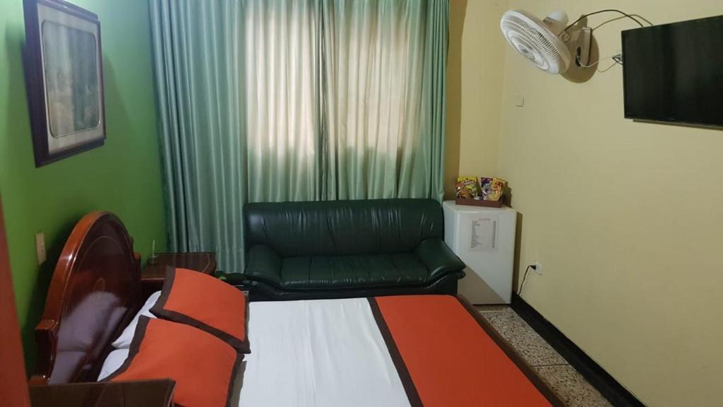 TV a/nebo společenská místnost v ubytování Hotel Tequendama