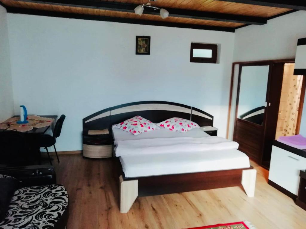 A bed or beds in a room at Casa Emilia