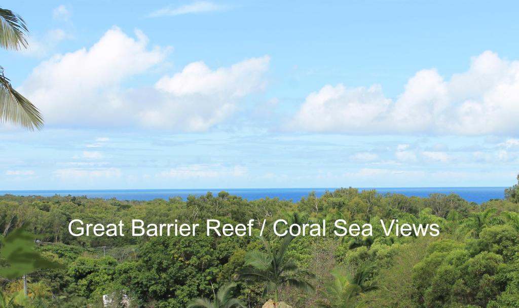 a view of the ocean from a green barrier reef coral sea views at SEAVIEWS Oak Beach in Oak Beach