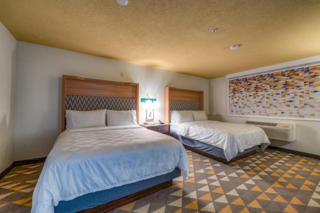 Postel nebo postele na pokoji v ubytování Holiday Inn Tacoma Mall by IHG