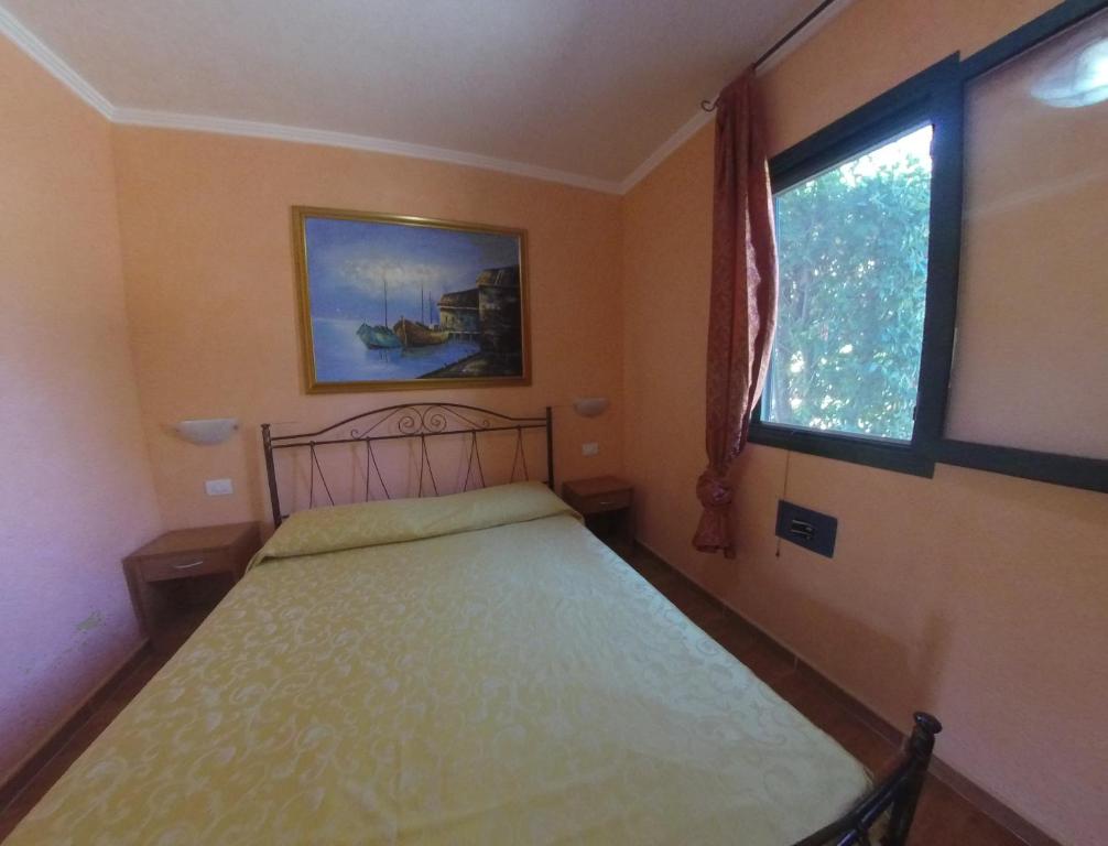 Postel nebo postele na pokoji v ubytování Villa Terra Nostra