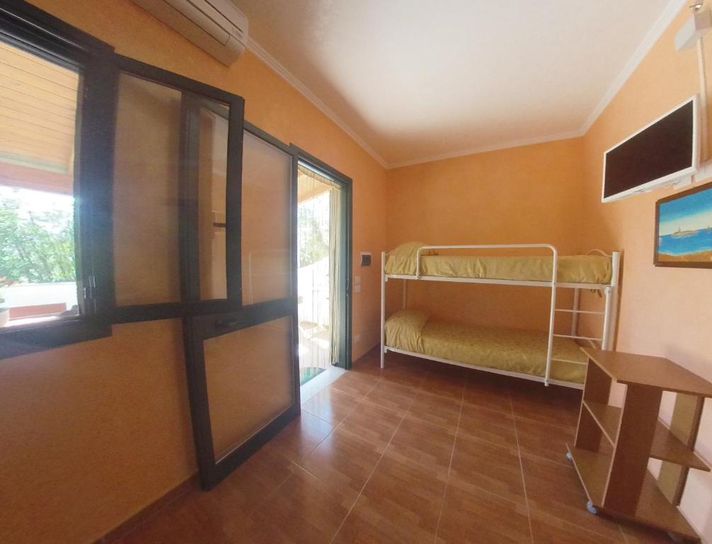 Postel nebo postele na pokoji v ubytování Villa Terra Nostra