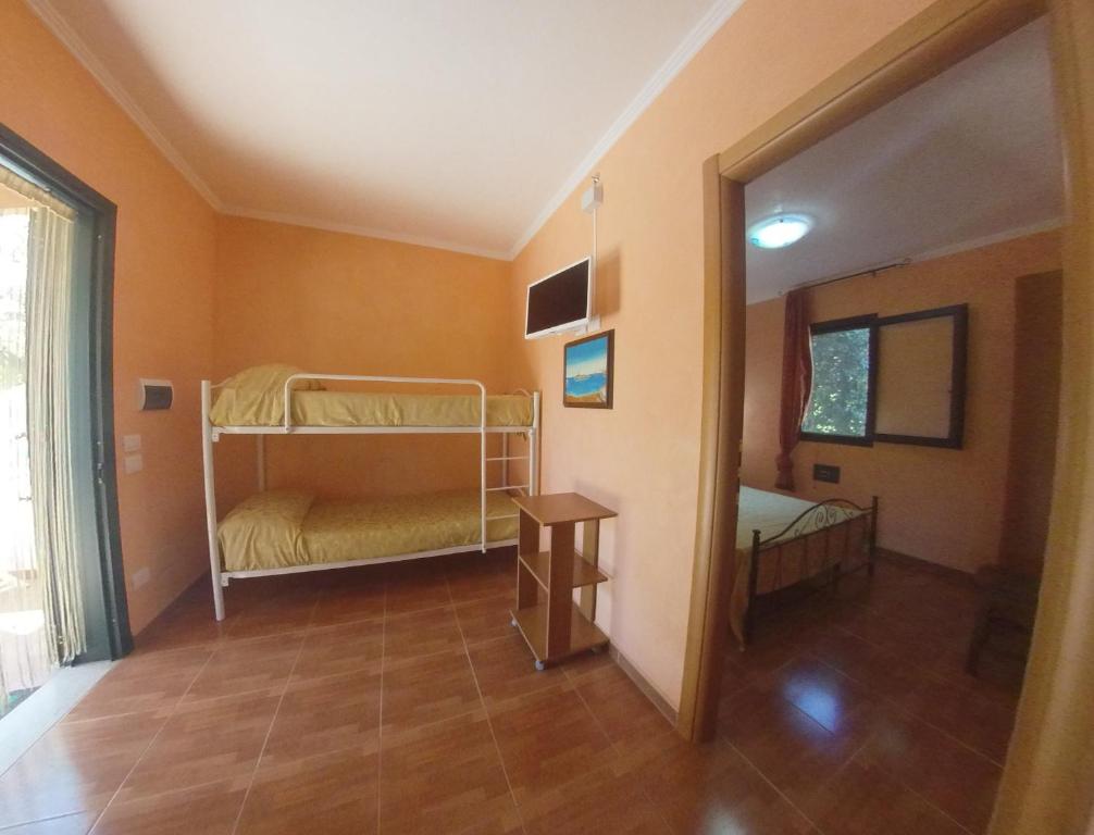 Postel nebo postele na pokoji v ubytování Villa Terra Nostra