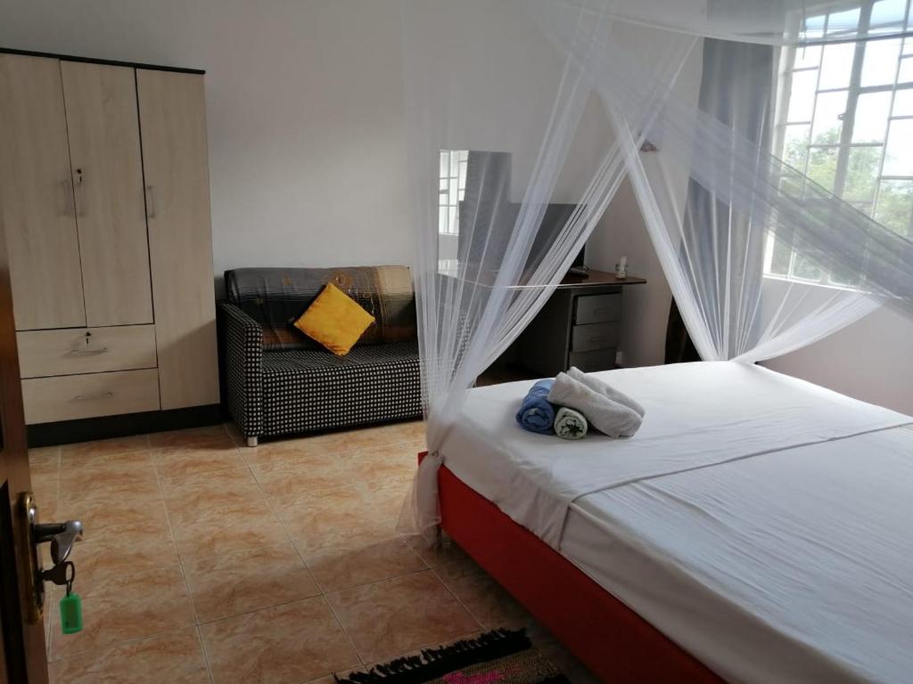 Postel nebo postele na pokoji v ubytování Surf House