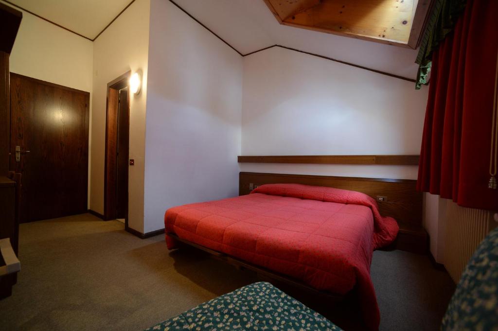 Postel nebo postele na pokoji v ubytování Hotel Compet