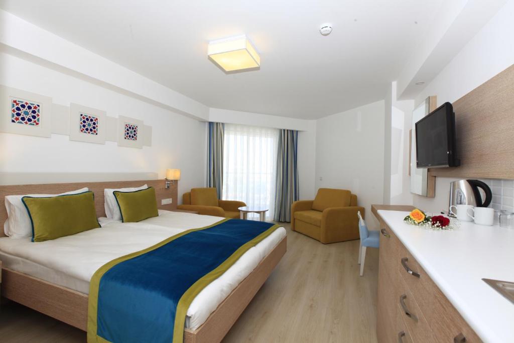 Postel nebo postele na pokoji v ubytování Side Su Hotel - Adult Only (+16)