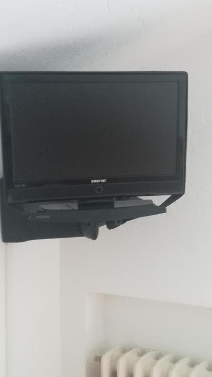 Telewizja i/lub zestaw kina domowego w obiekcie Affittacamere Entreves