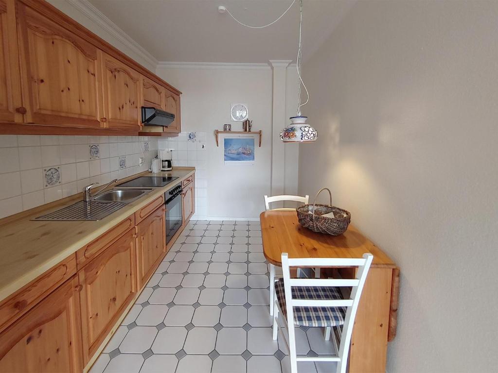 Kuchyň nebo kuchyňský kout v ubytování Ferienwohnung *Hafenblick*