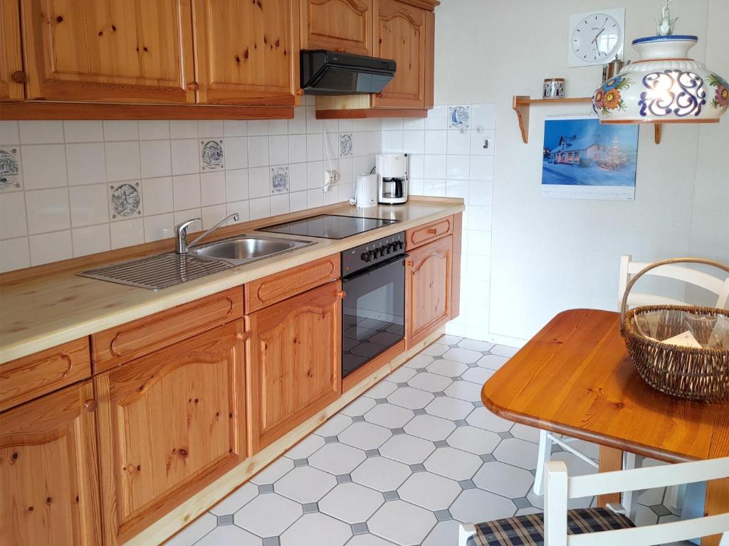 Kuchyň nebo kuchyňský kout v ubytování Ferienwohnung *Hafenblick*