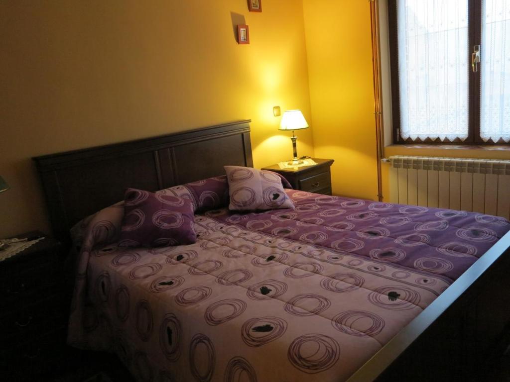 Säng eller sängar i ett rum på El Arco (Vivienda Uso Turístico)