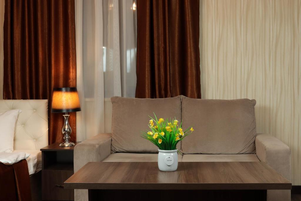 Posezení v ubytování De'Mar Hotel