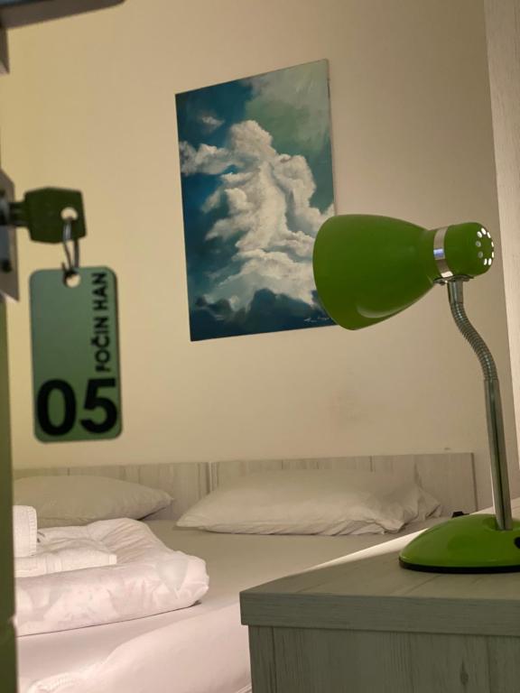 Postel nebo postele na pokoji v ubytování Pansion Fočin Han