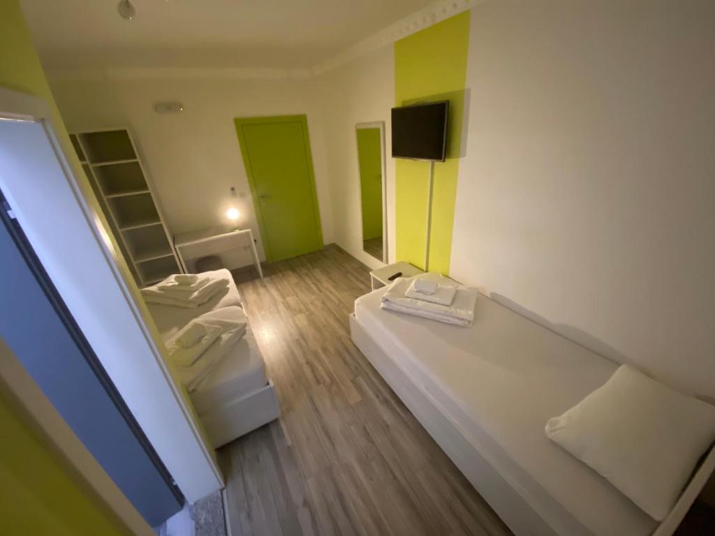 Postel nebo postele na pokoji v ubytování Pansion Fočin Han