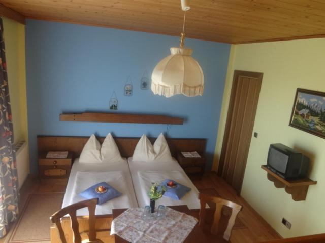 Postel nebo postele na pokoji v ubytování Gasthof Gangl