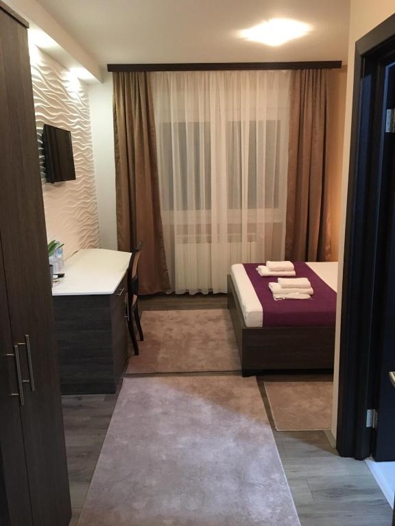 Postel nebo postele na pokoji v ubytování Luxury Apartments 88