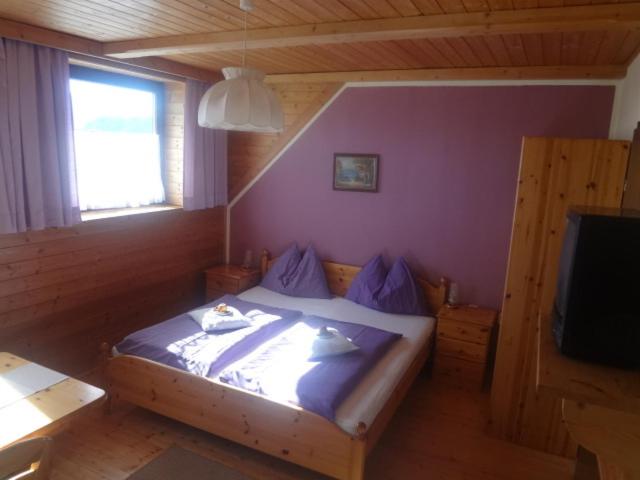 Postel nebo postele na pokoji v ubytování Gasthof Gangl