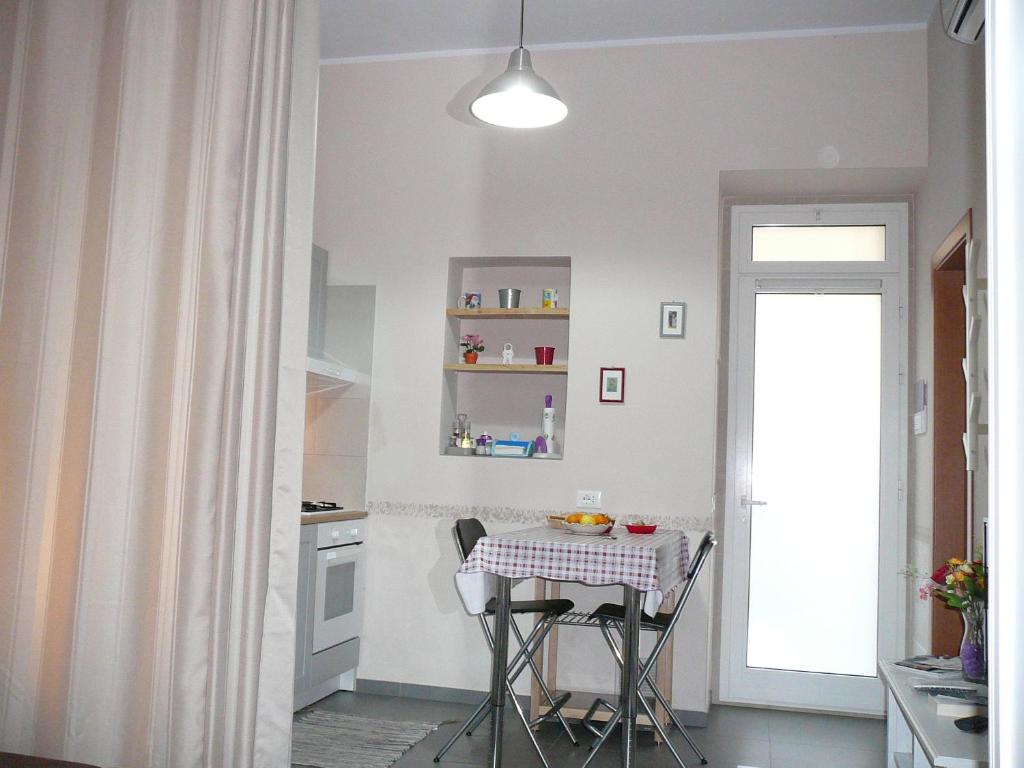 Kuchyňa alebo kuchynka v ubytovaní Casa Mia locazione turistica