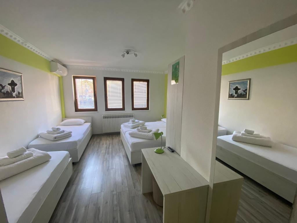 Postel nebo postele na pokoji v ubytování Pansion Fočin Han