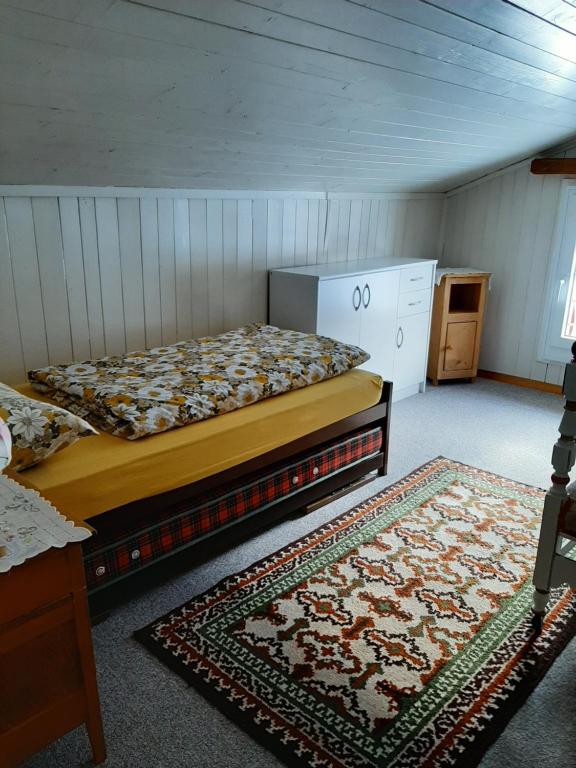 Postel nebo postele na pokoji v ubytování Casa Schuoler