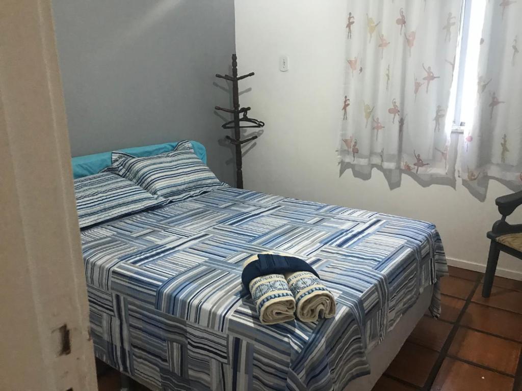 Cama ou camas em um quarto em APARTAMENTO Praia do Forte - Cabo Frio