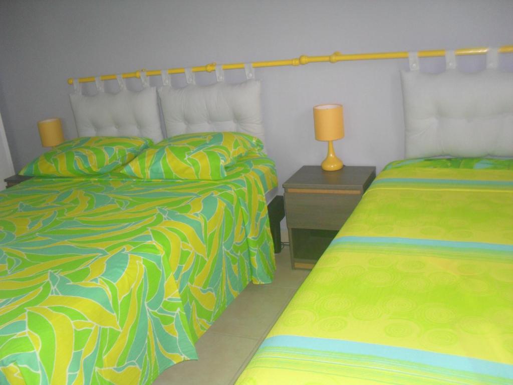 Postel nebo postele na pokoji v ubytování Ti Kaz en Nou'